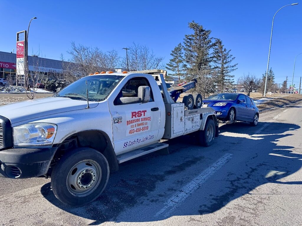 Wrecker tow truck service by RST Roadside Service & Towing In Calgary