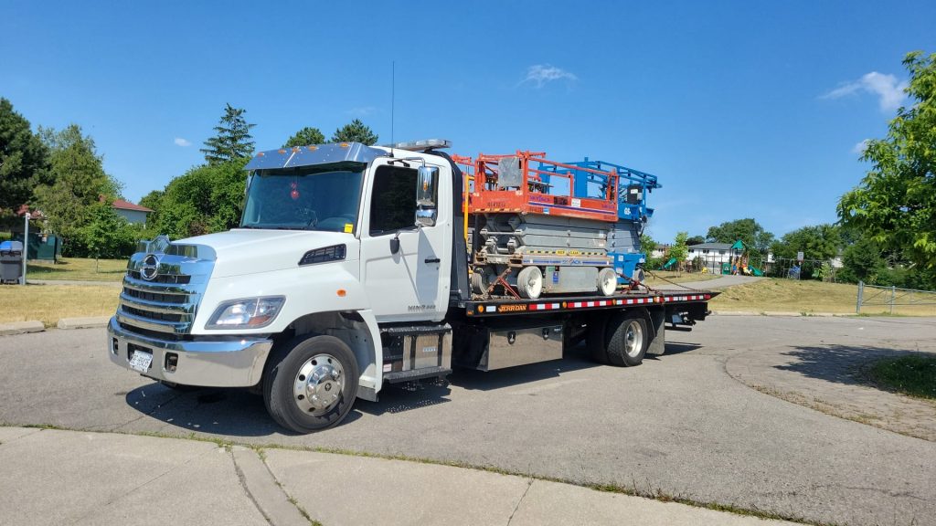 scissor lift towing service in calgary by rst towing